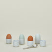 Set of 6 porcelain european style egg cups in white with eggs and spoon