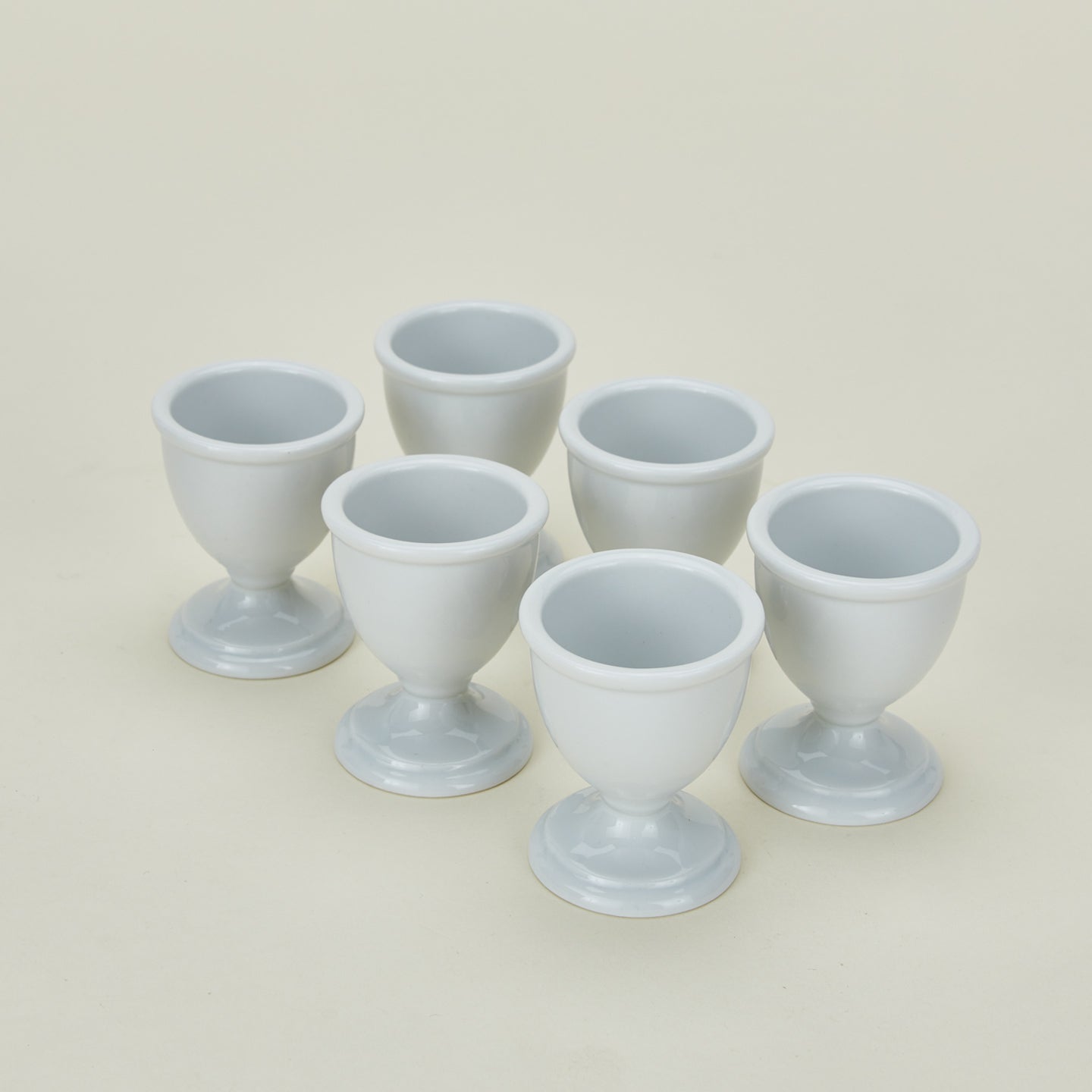 Set of 6 porcelain traditional style egg cups in white