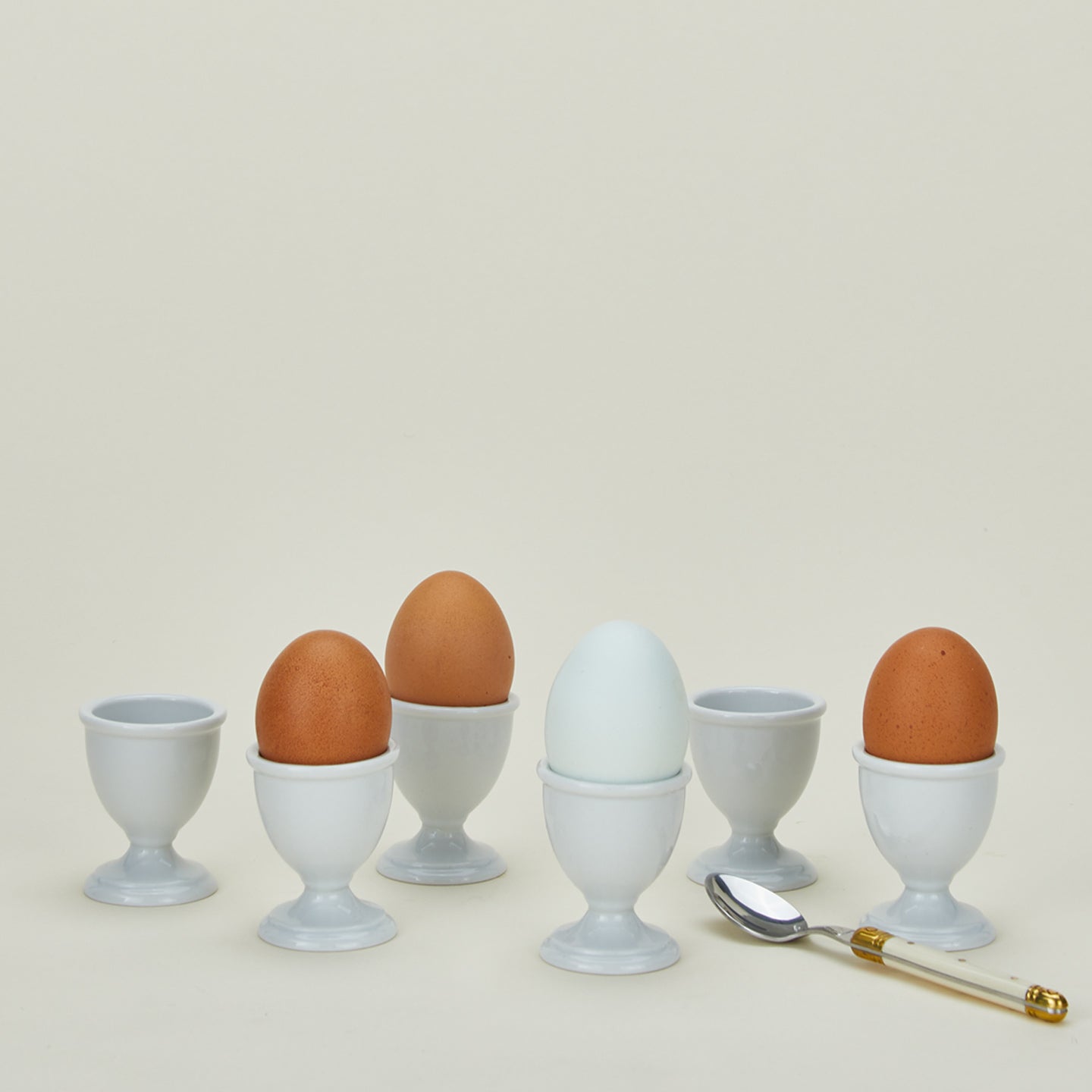 Set of 6 porcelain traditional style egg cups in white