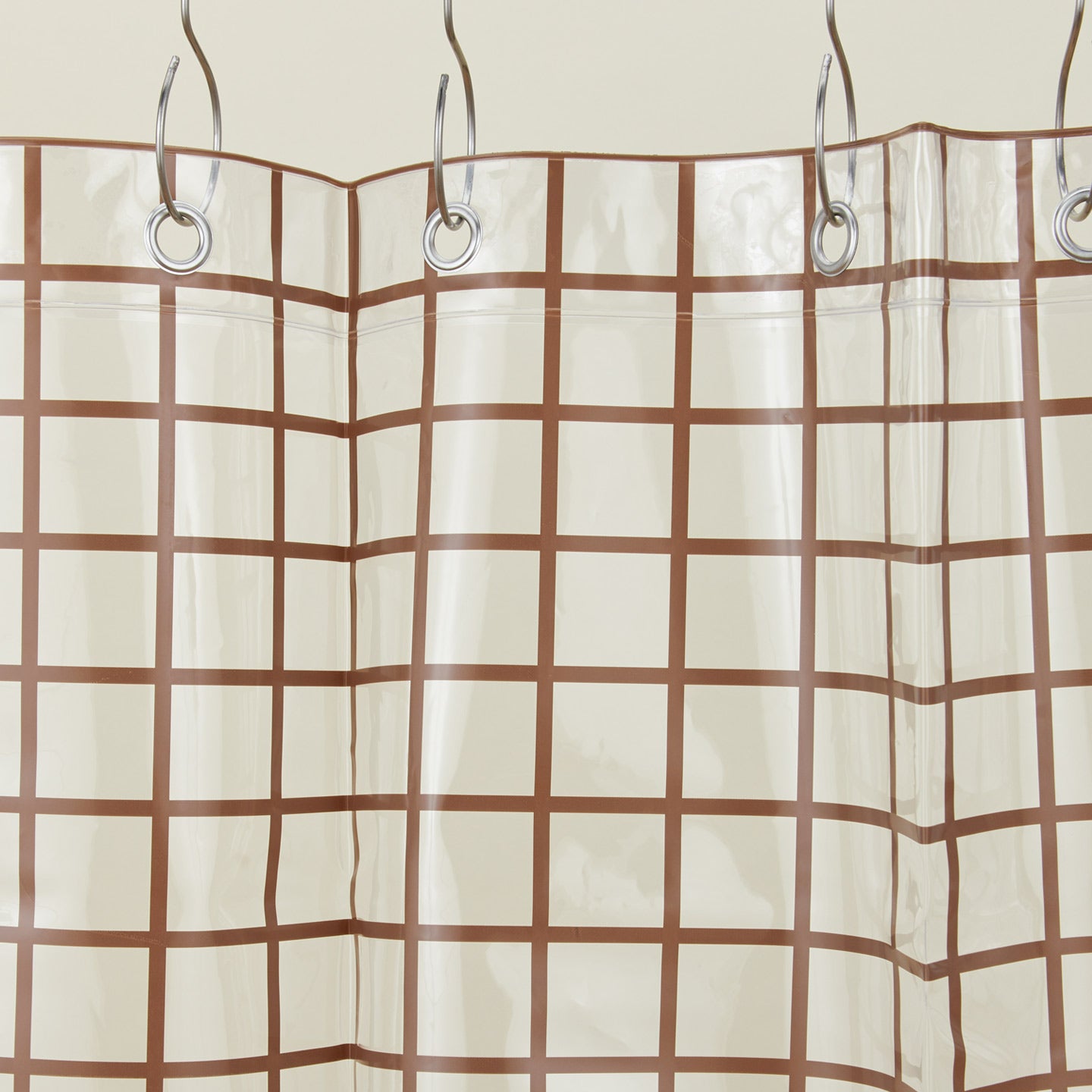 Sun grid shower curtain in chocolate