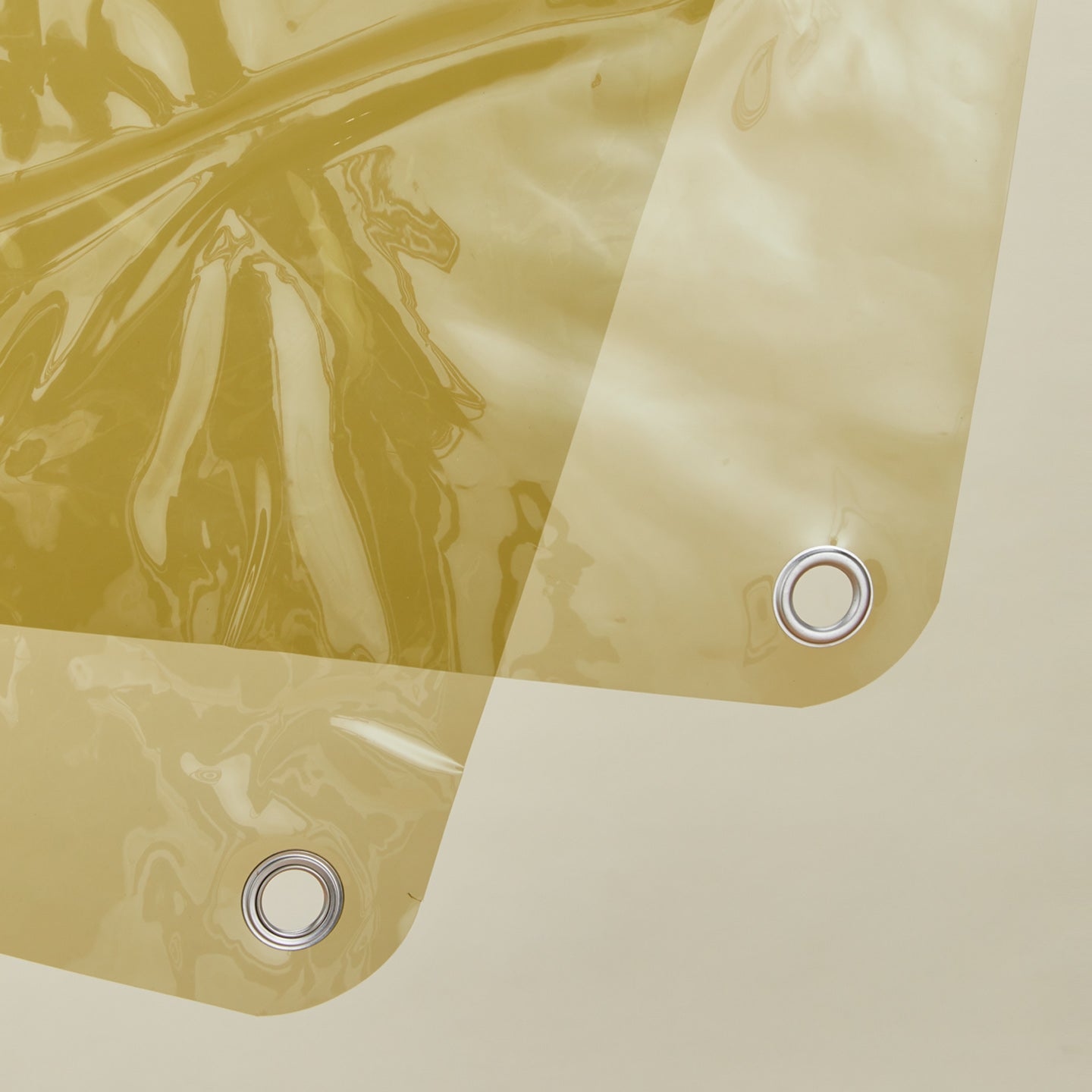 Close up view of sunny shower curtain in olive
