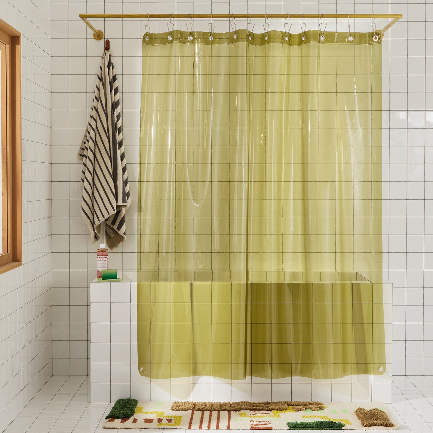 Sunny shower curtain in olive in bathroom