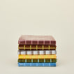 Sun grid shower curtains in various colors