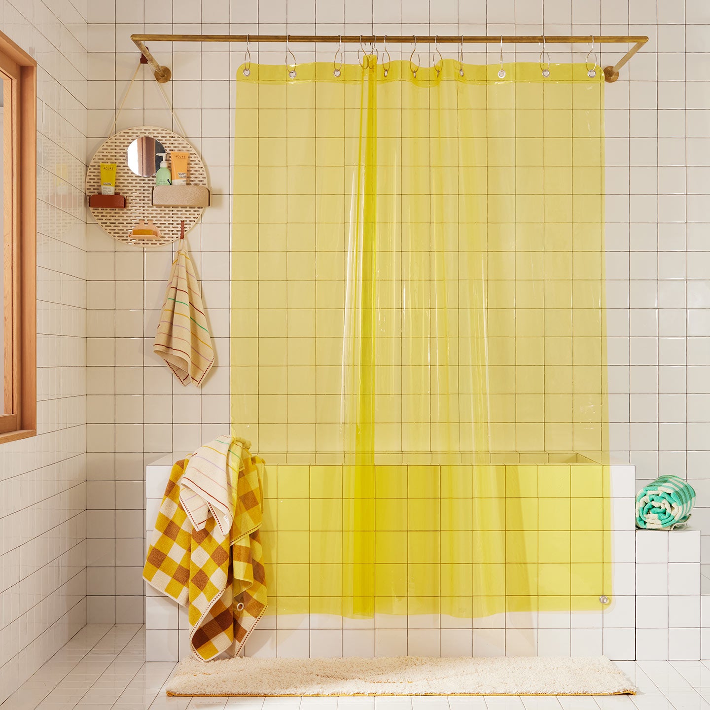 Sunny shower curtain in sun in bathroom