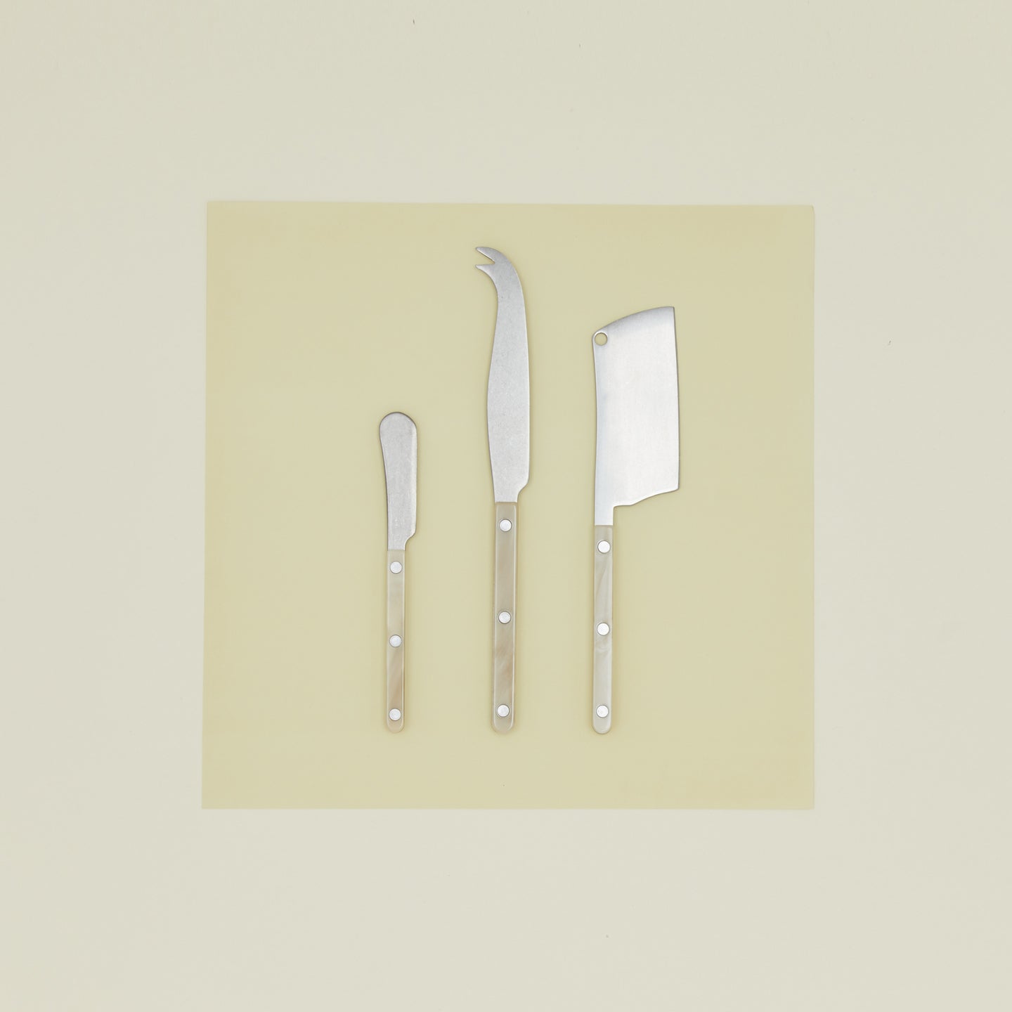 Set of three Cheese Knives in Faux Horn.