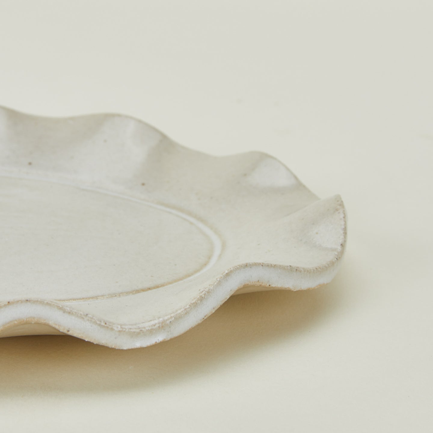 Close up view of ruffle edge platter