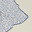 Close up view of little flowers napkin in blue