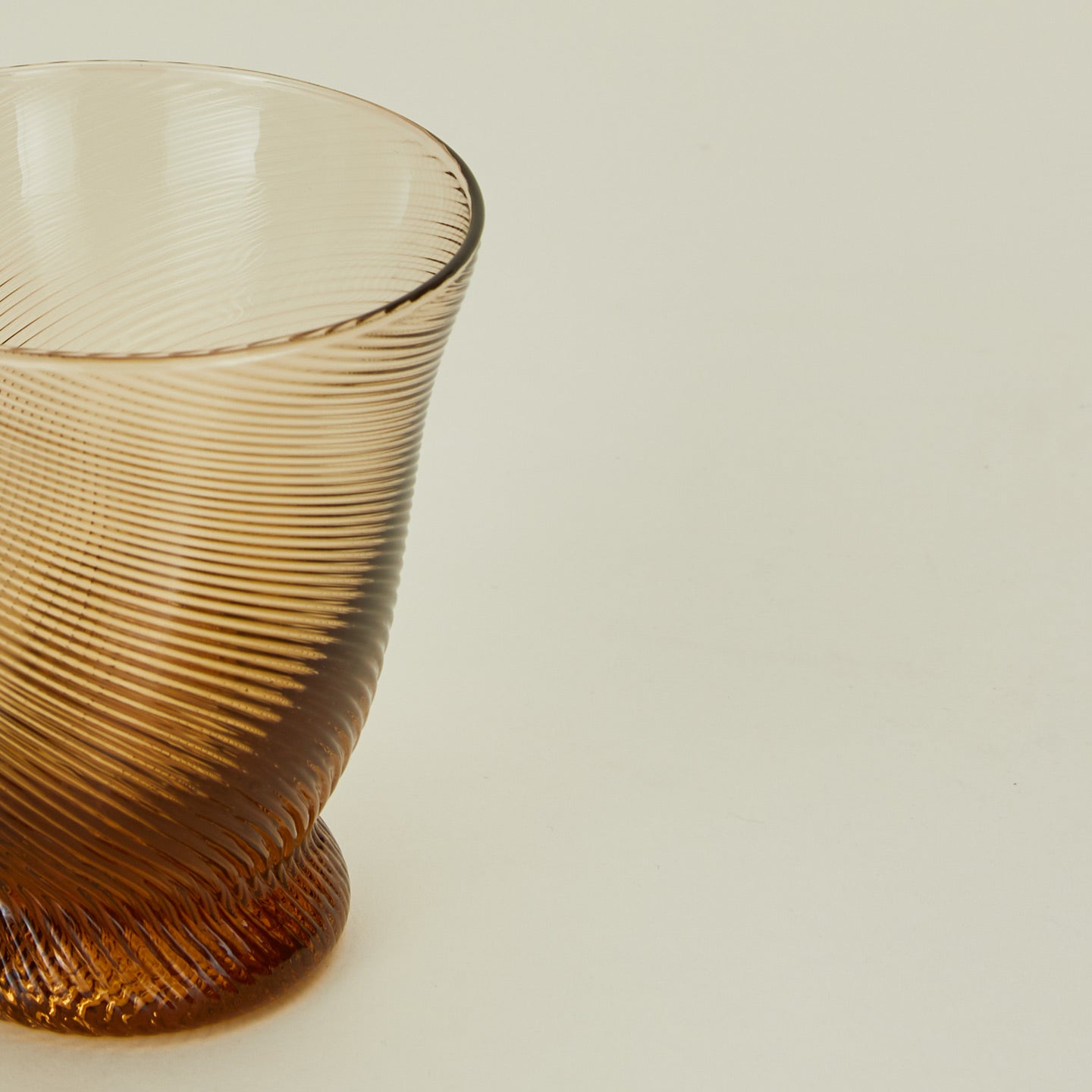 Close up view of Sharland spiral tumbler in brown.