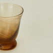 Close up view of Sharland spiral tumbler in brown.