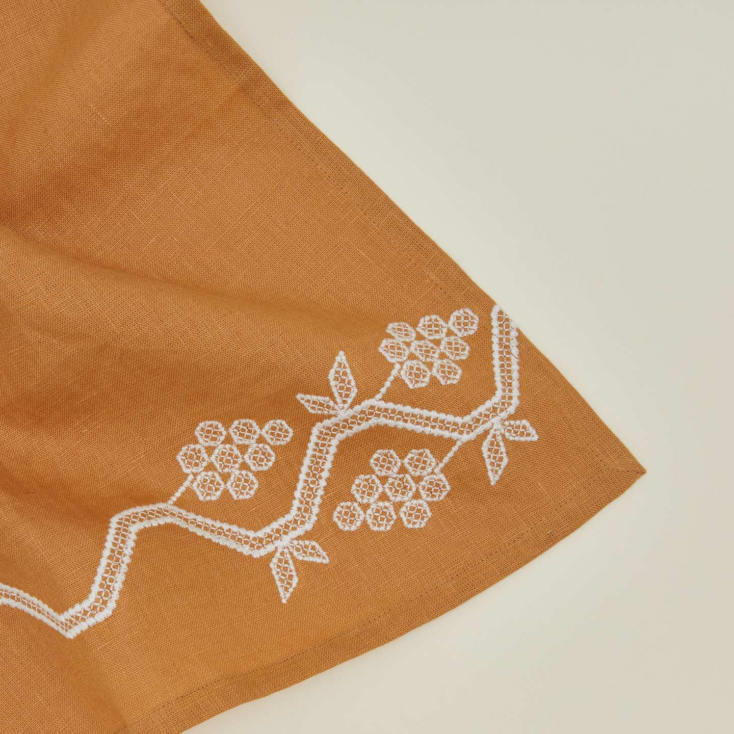 Close up view of napa napkin in mustard