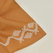 Close up view of napa napkin in mustard