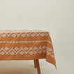 Napa tablecloth in mustard on table.