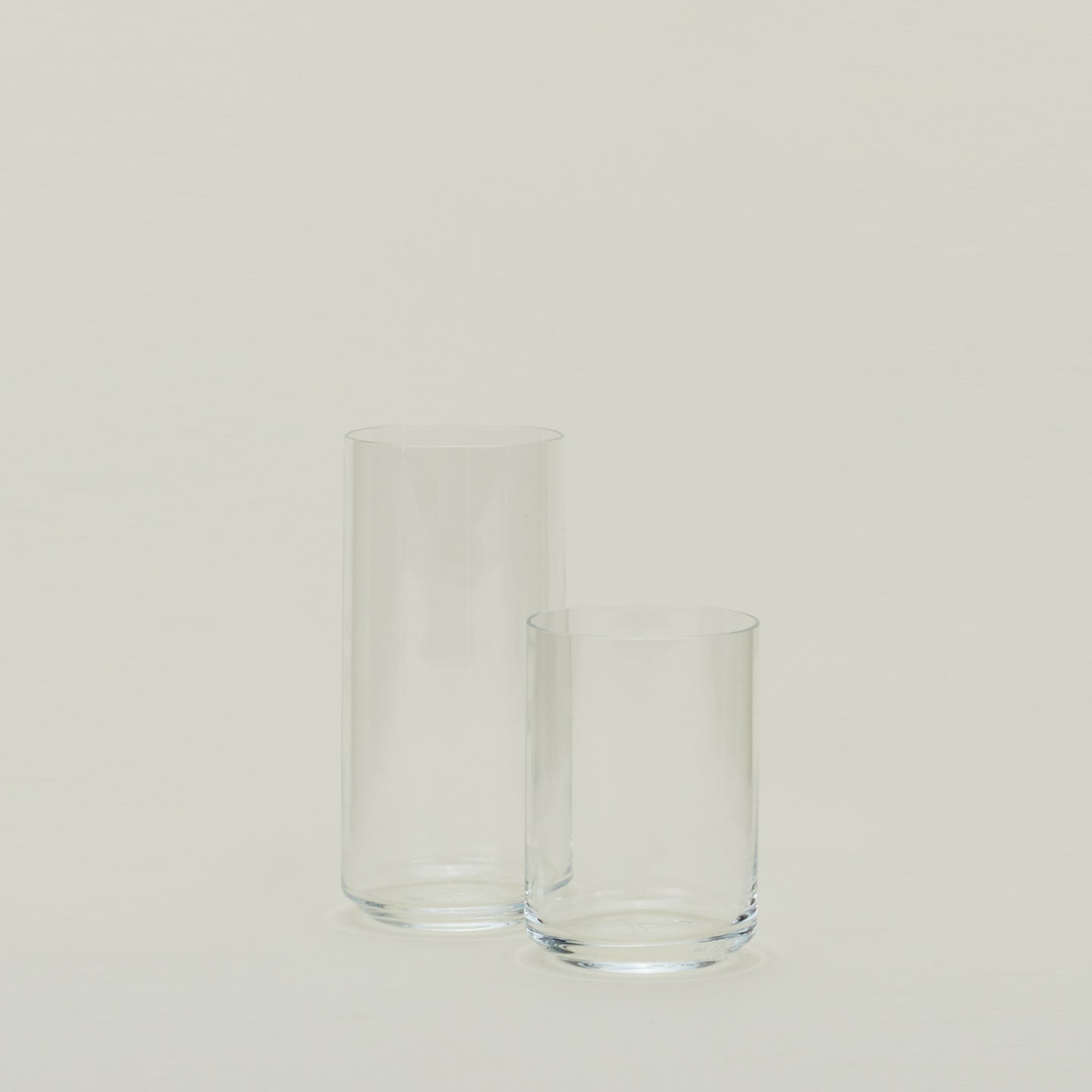 Two clear Simple Glasses in various sizes.