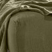 Simple linen bedding in olive