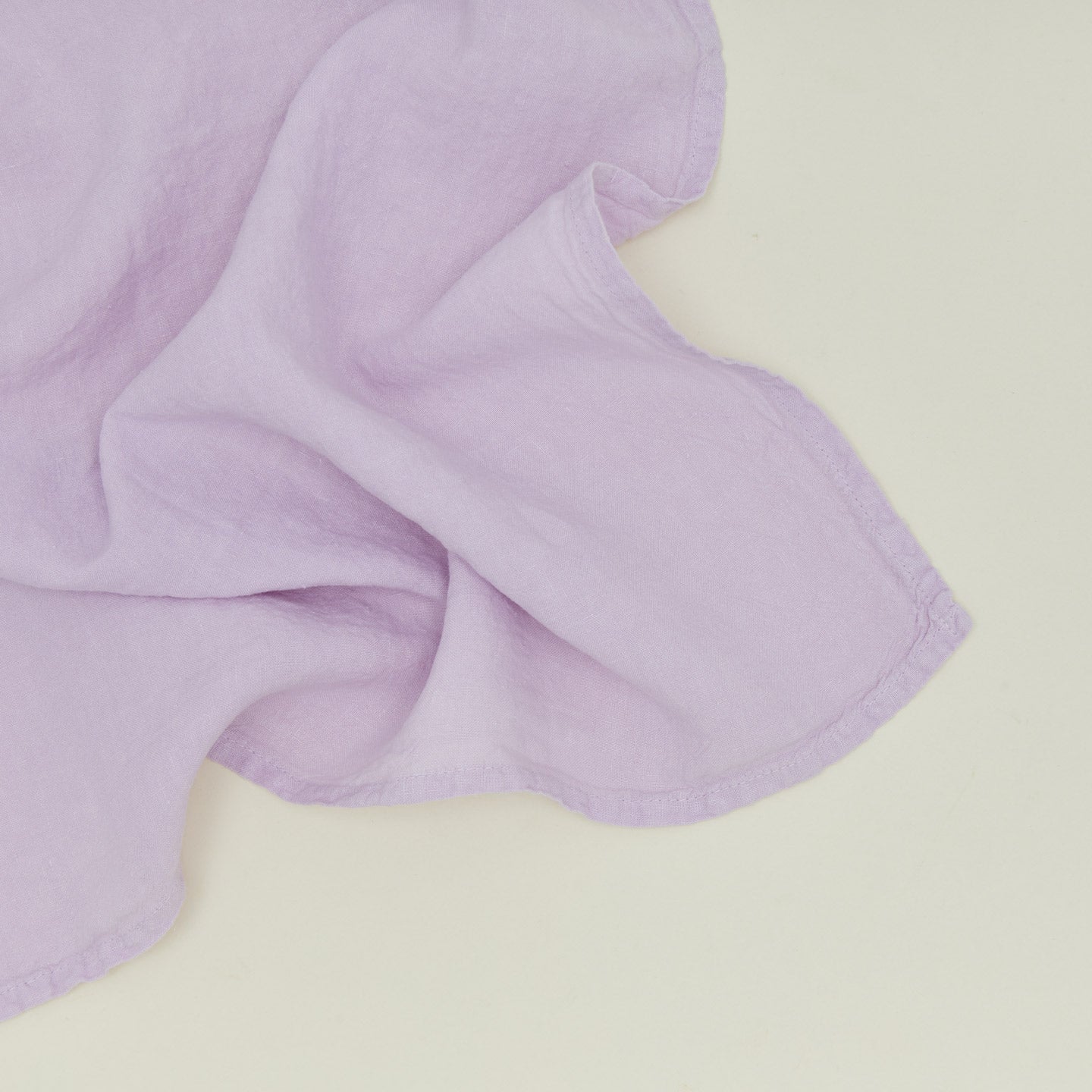 Detailed view of simple linen napkin in lilac