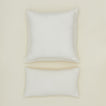 Simple linen pillow in ivory