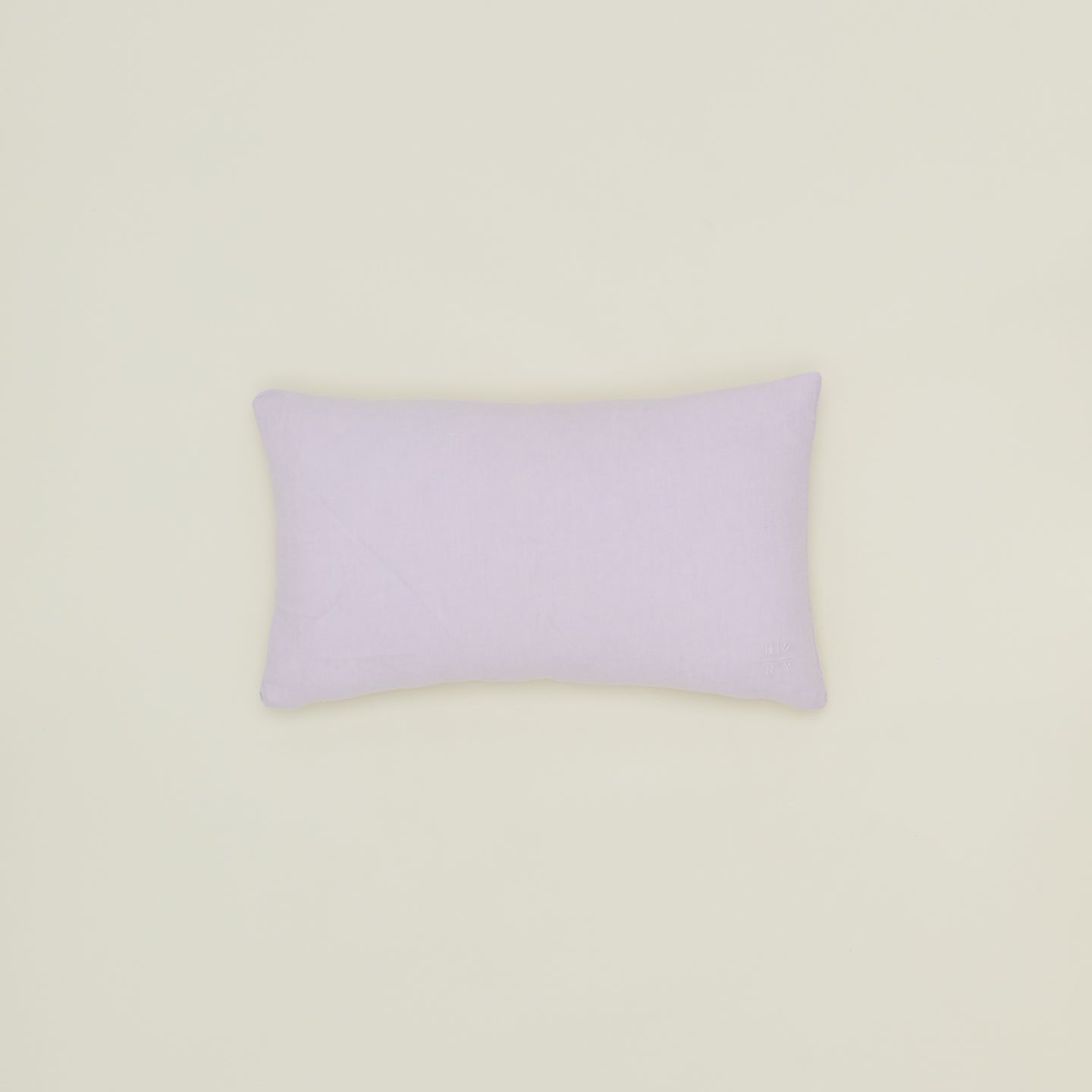 Simple linen pillow in lilac