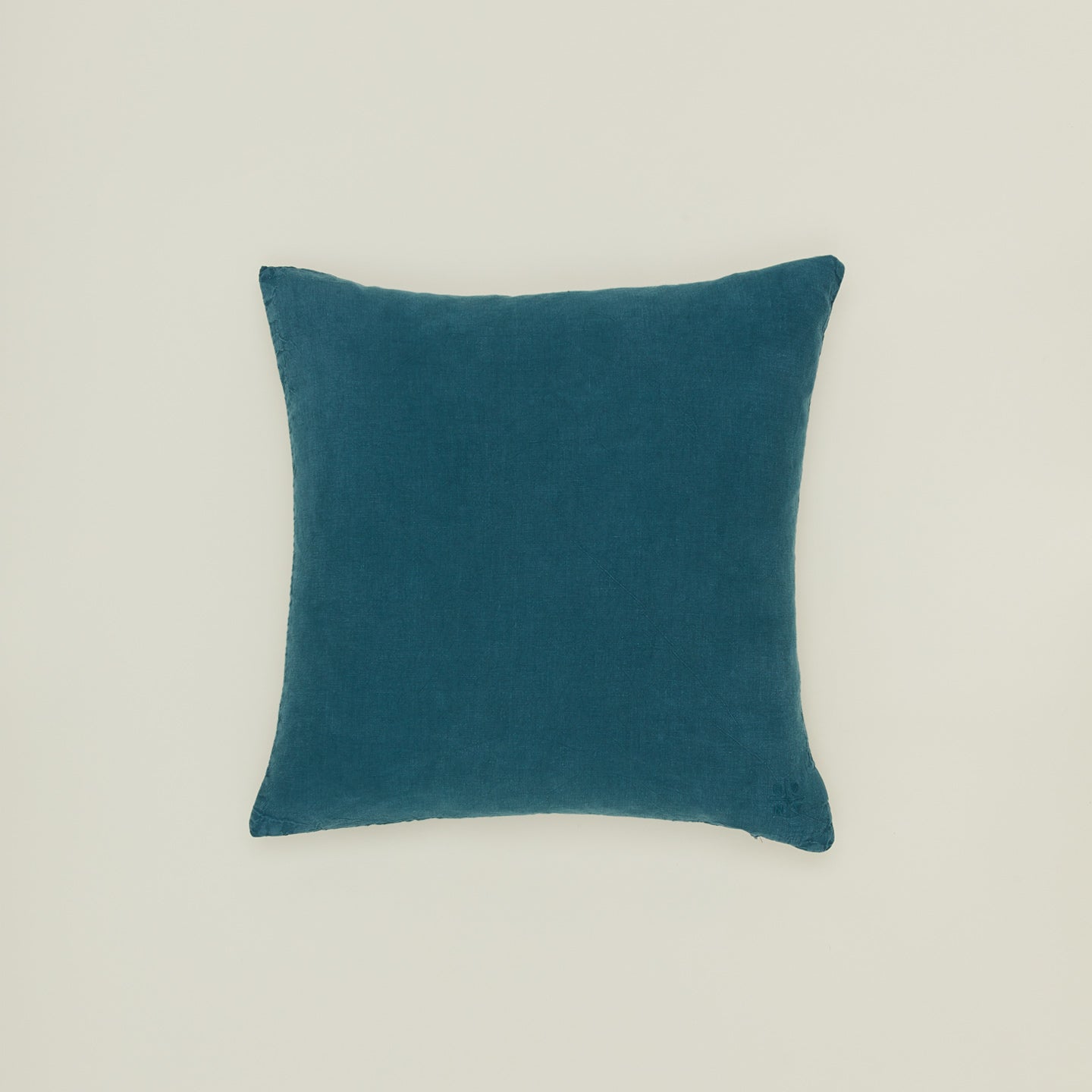 Simple linen pillow in peacock