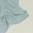 Detailed view of simple linen napkin in sky