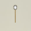 Simple metal spoon in brass