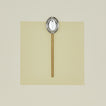 Simple metal spoon in brass