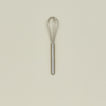 Simple metal whisk in silver