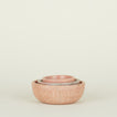 Three Simple Marble Bowls in various sizes in Pink, nested.