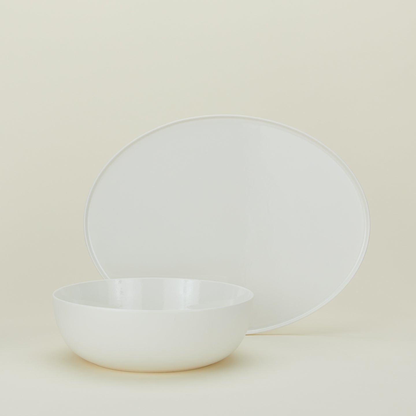 Simple Porcelain serving set with serving bowl and platter in white