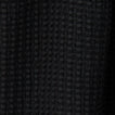 Close up view of simple waffle shower curtain in black