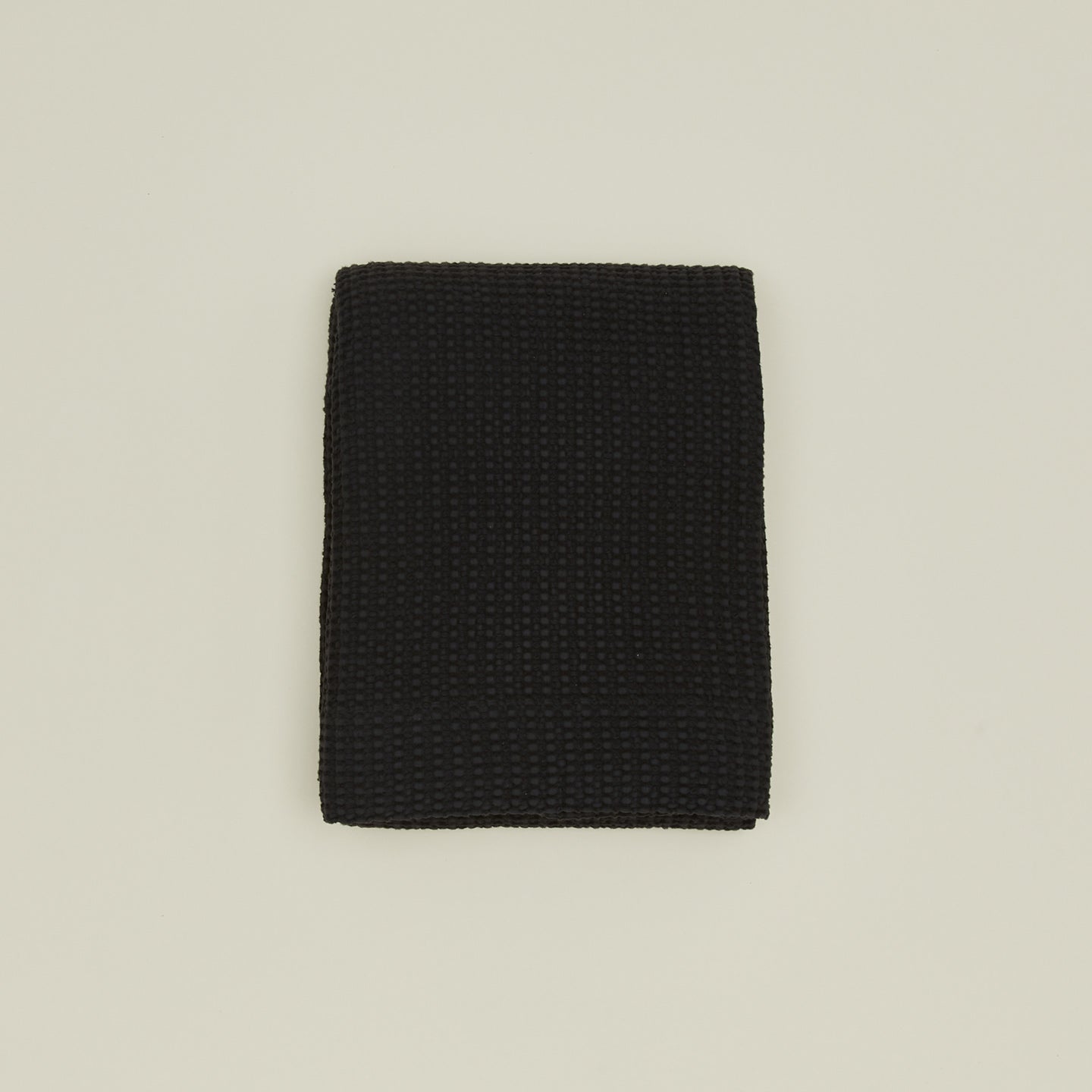 Simple waffle shower curtain in black