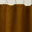 Simple waffle shower curtain in bronze