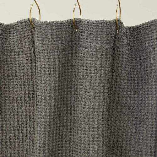 Simple waffle shower curtain in dark grey