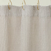 Simple waffle shower curtain in light grey