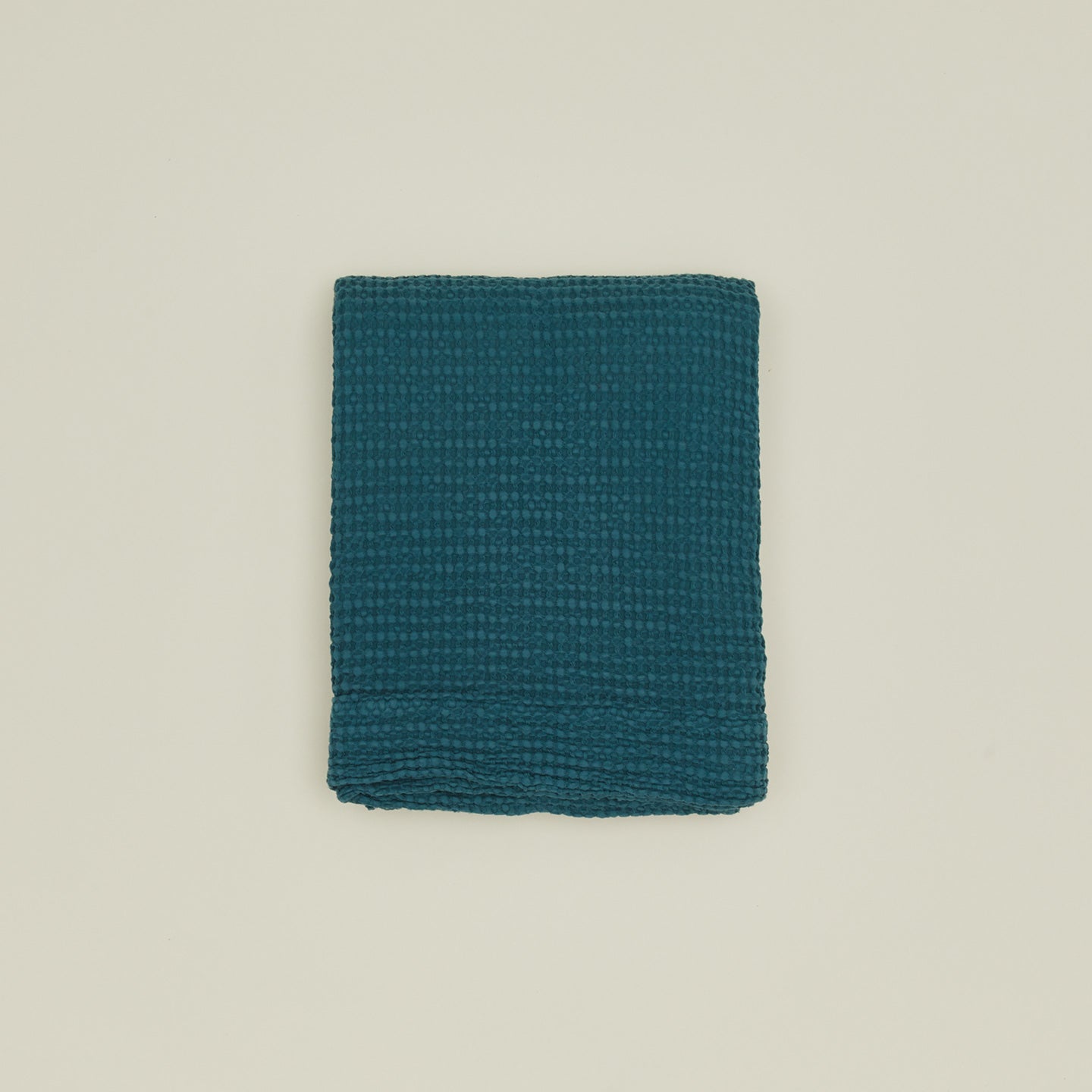 Simple waffle shower curtain in peacock