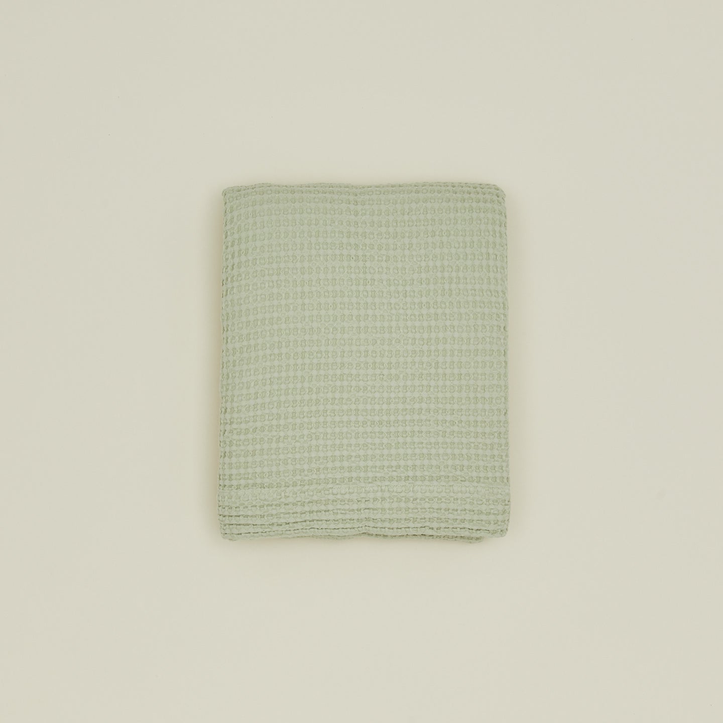 Simple waffle shower curtain in sage.