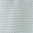 Close up view of simple waffle shower curtain in sky