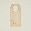 Large arched cutting board with two garlic cloves