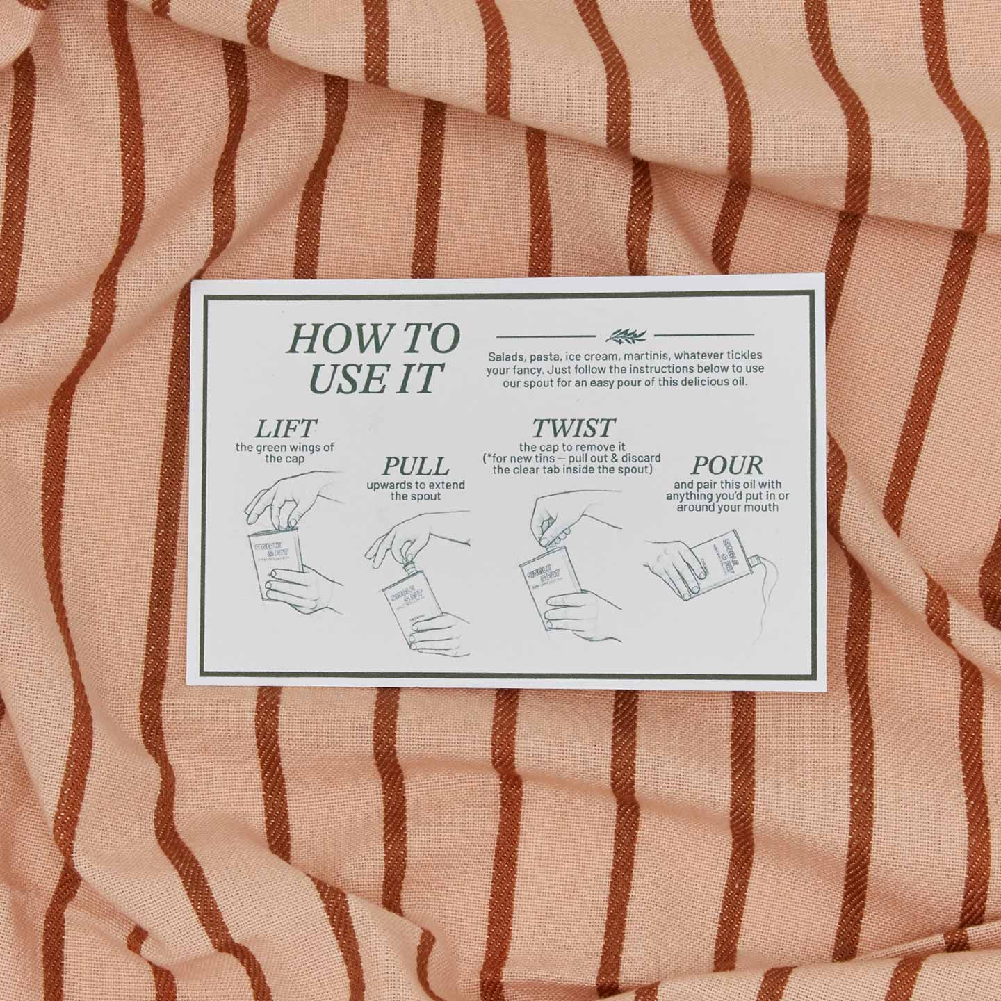 Striped towel with a label on top displaying 'How to Use It' instructions.