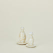 Splatterware candlestick holders in ivory and white
