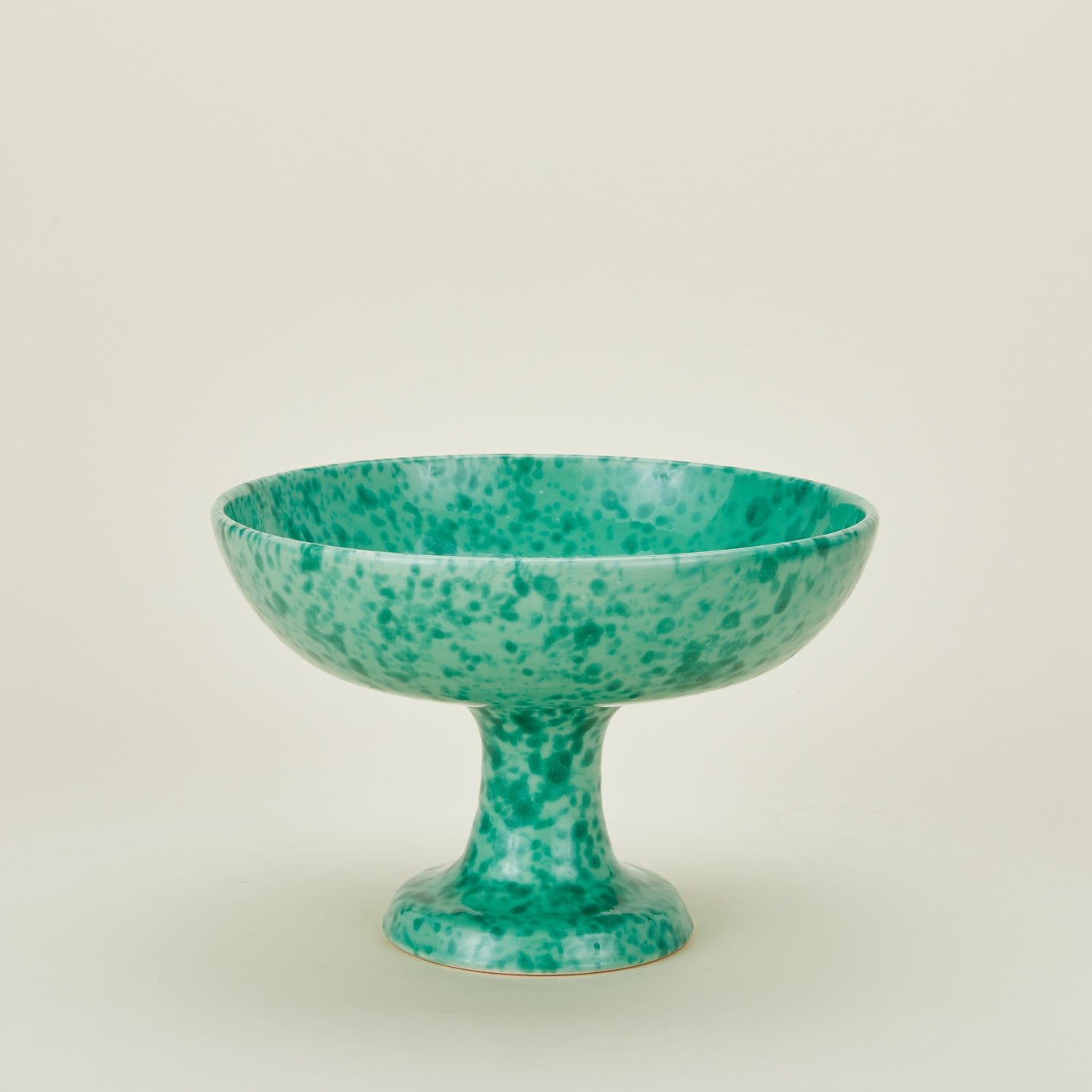 Splatterware footed bowl in sage and green