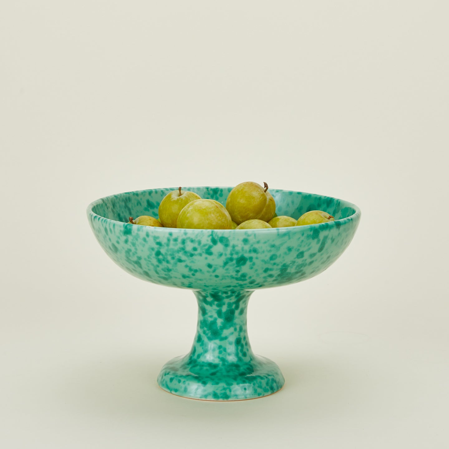 Splatterware footed bowl in sage and green with limes
