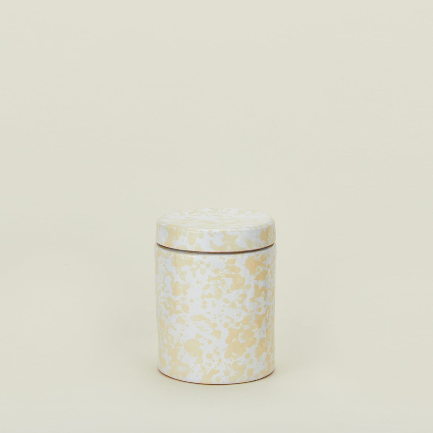 Medium splatterware canister in white and ivory