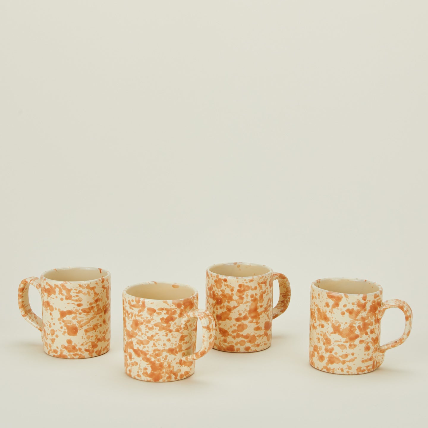 Splatterware mugs set of 4 in ivory and bronze