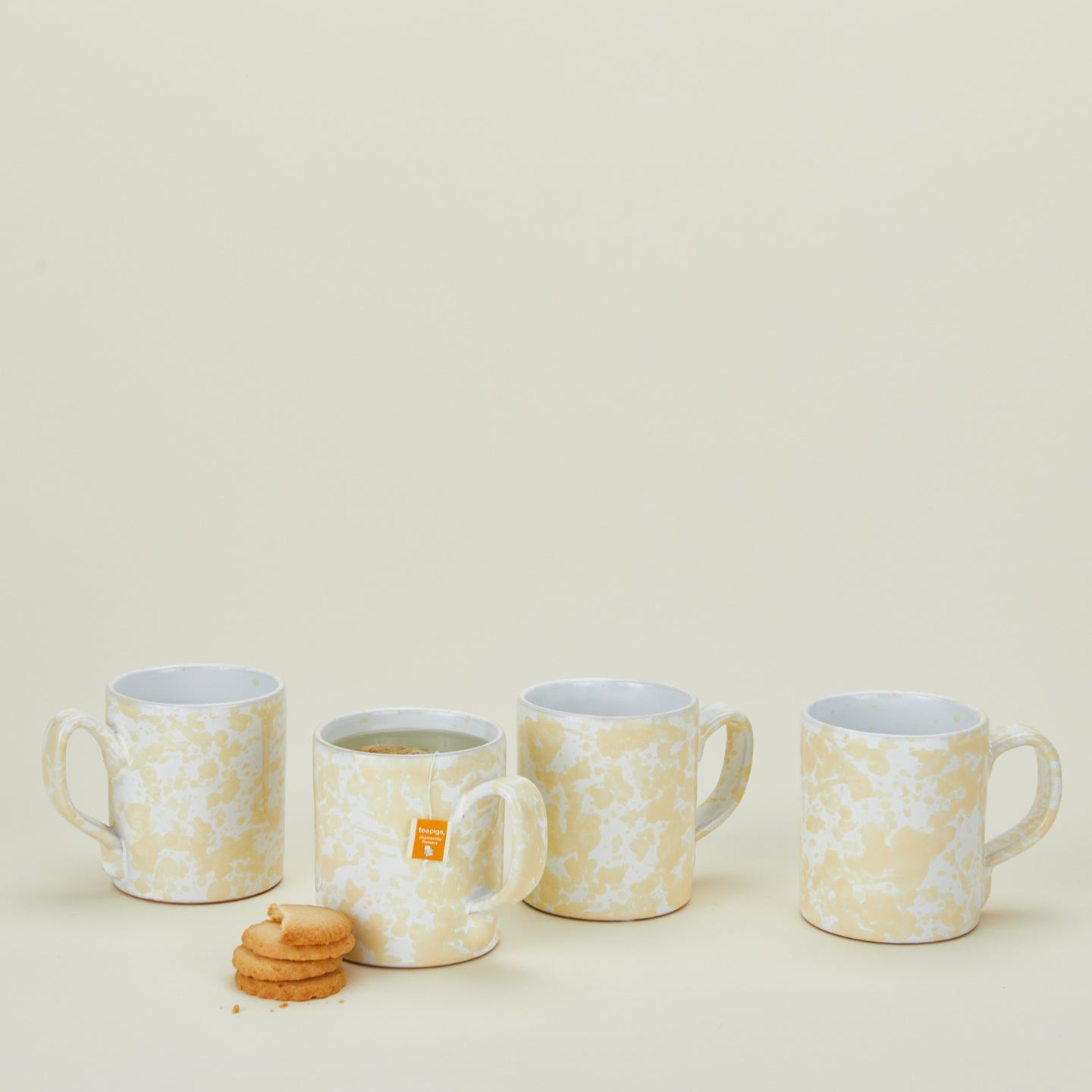 Splatterware mugs set of 4 in white and ivory with tea and cookies