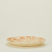 Splatterware serving platter in ivory and bronze