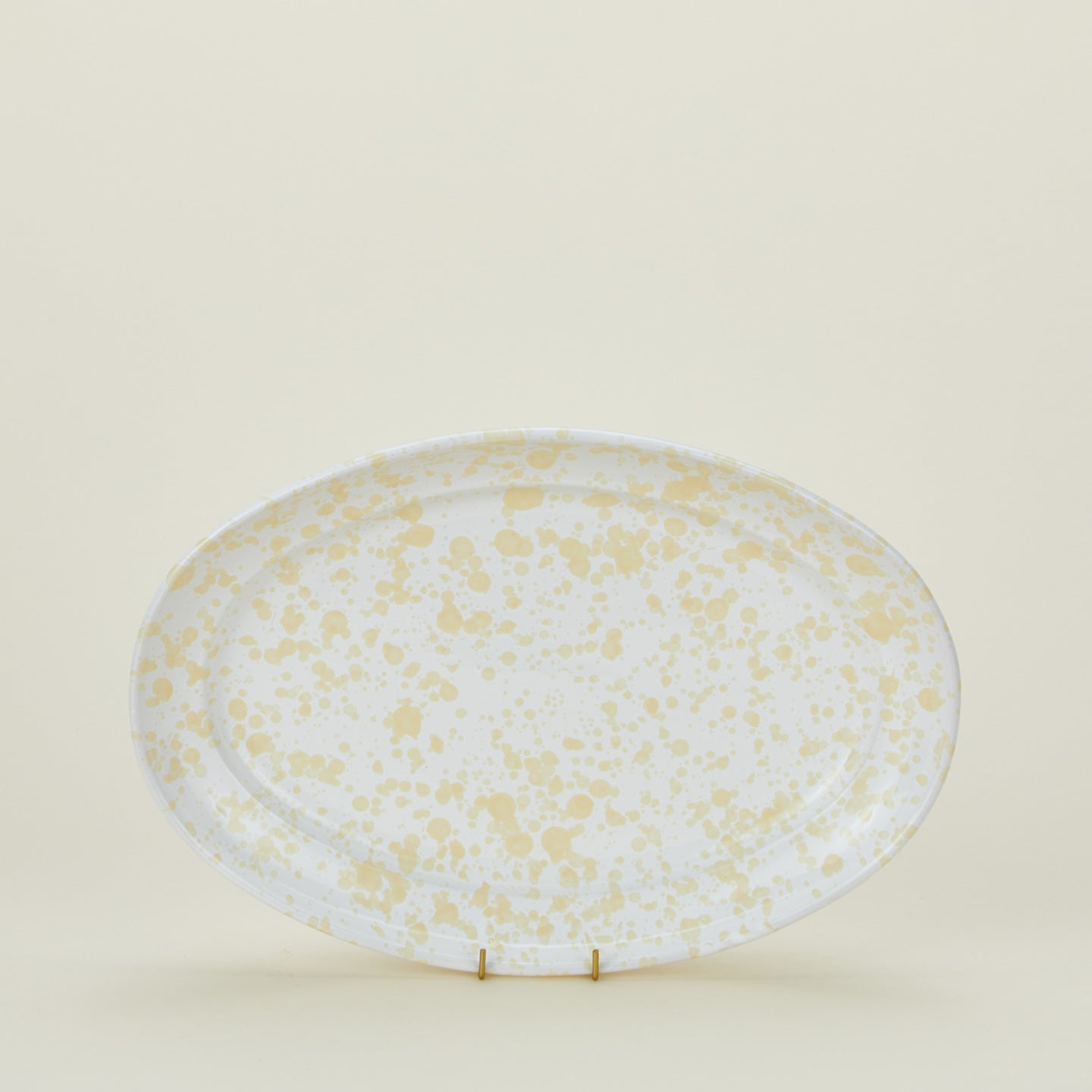 Splatterware serving platter in white and ivory