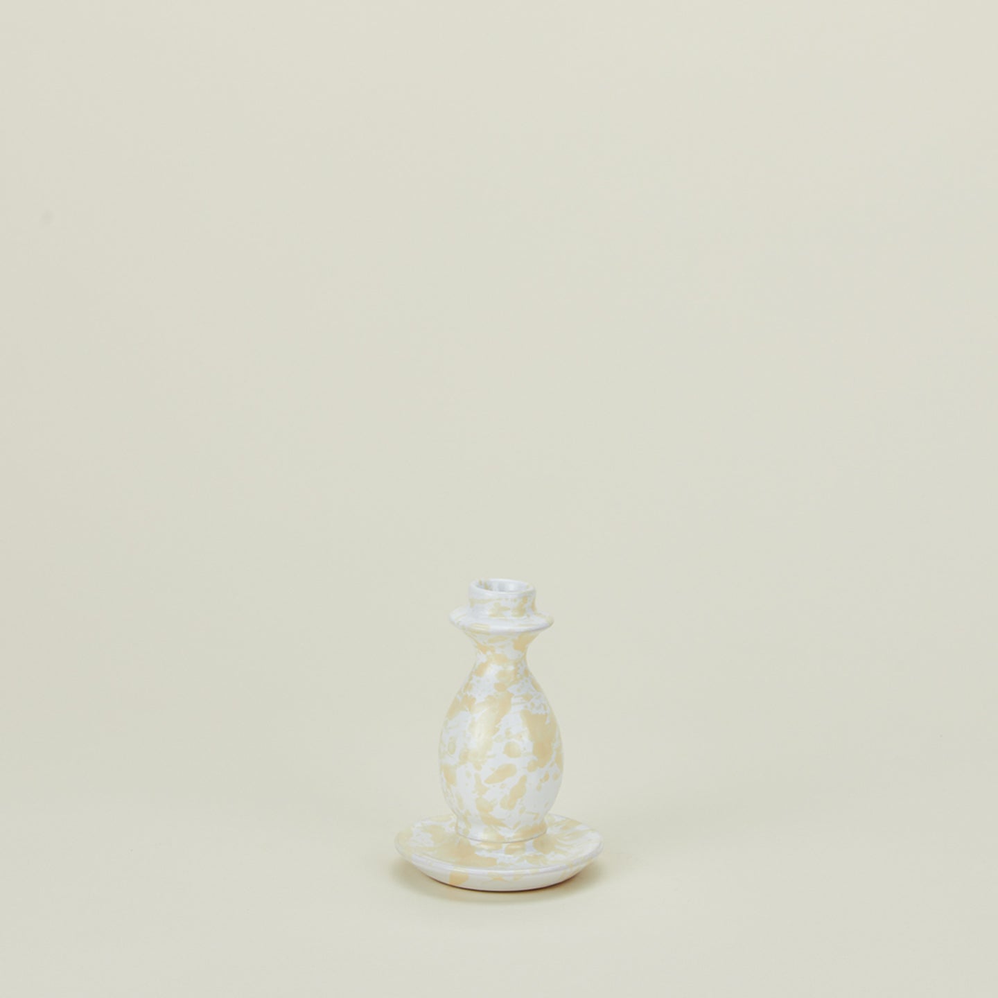 Small candlestick holder in white and bronze