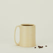 Tall Ribbed Mug in Butter.