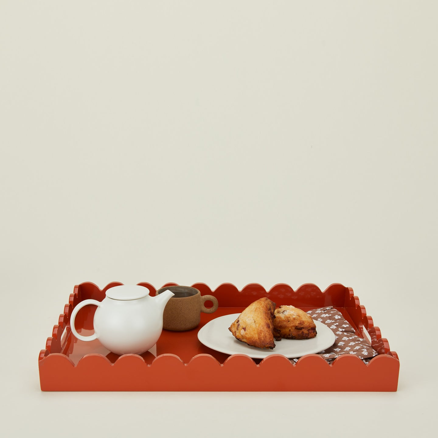 Spice serving tray with scones and tea