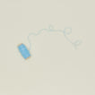 Tinsel ribbon in sky unspooling on neutral background